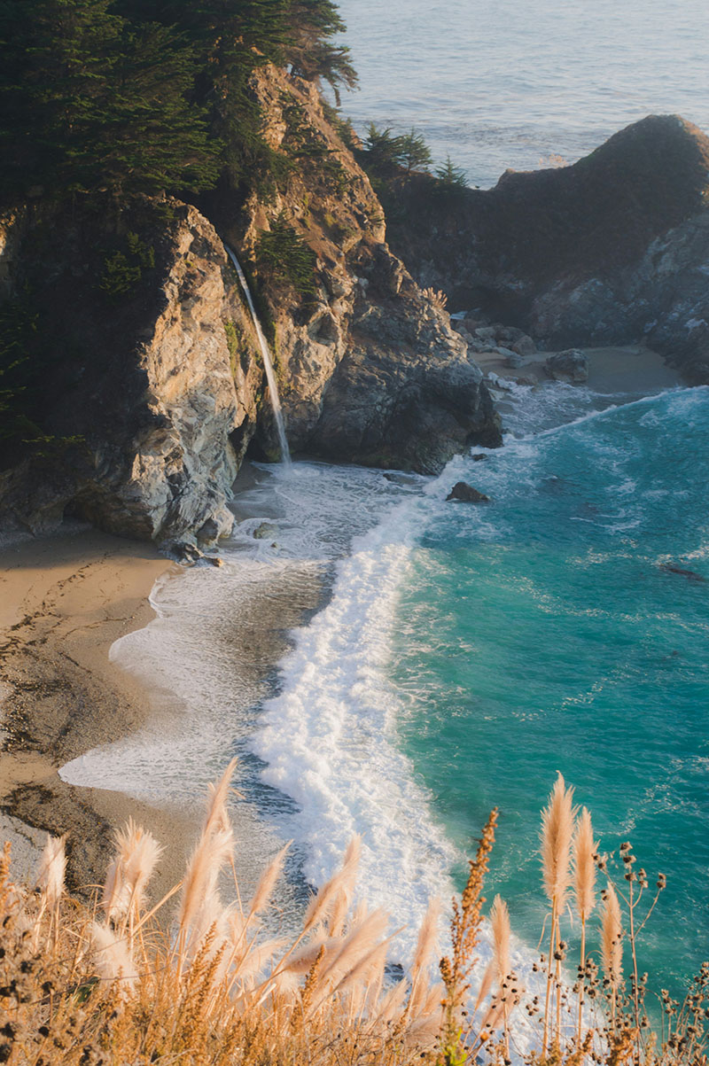 Whatever the weather, McWay Falls is a popular stop along the Big Sur coastal tour