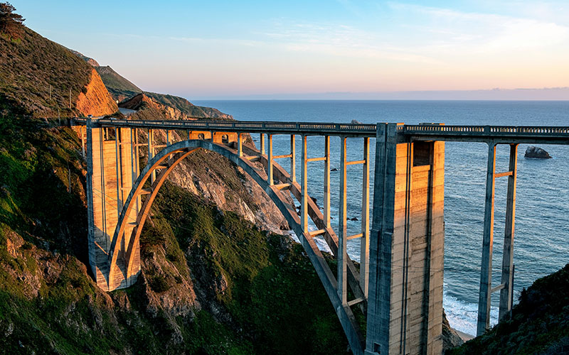 California Horizon Tours safely stops at iconic sights like the Bixby Bridge in Big Sur